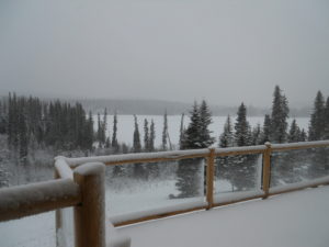 West hills are obliterated by falling snow April 18