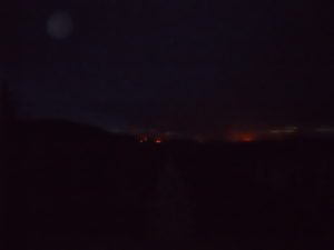 Eerie glow from fire piles  on the south shoe at night.