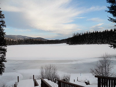 Early ice on Little Lac des Roches may still have holes above the springs near the shore. Anyone using the ice for recreation is urged to use caution. — image credit: Sharron Woloshyn photo